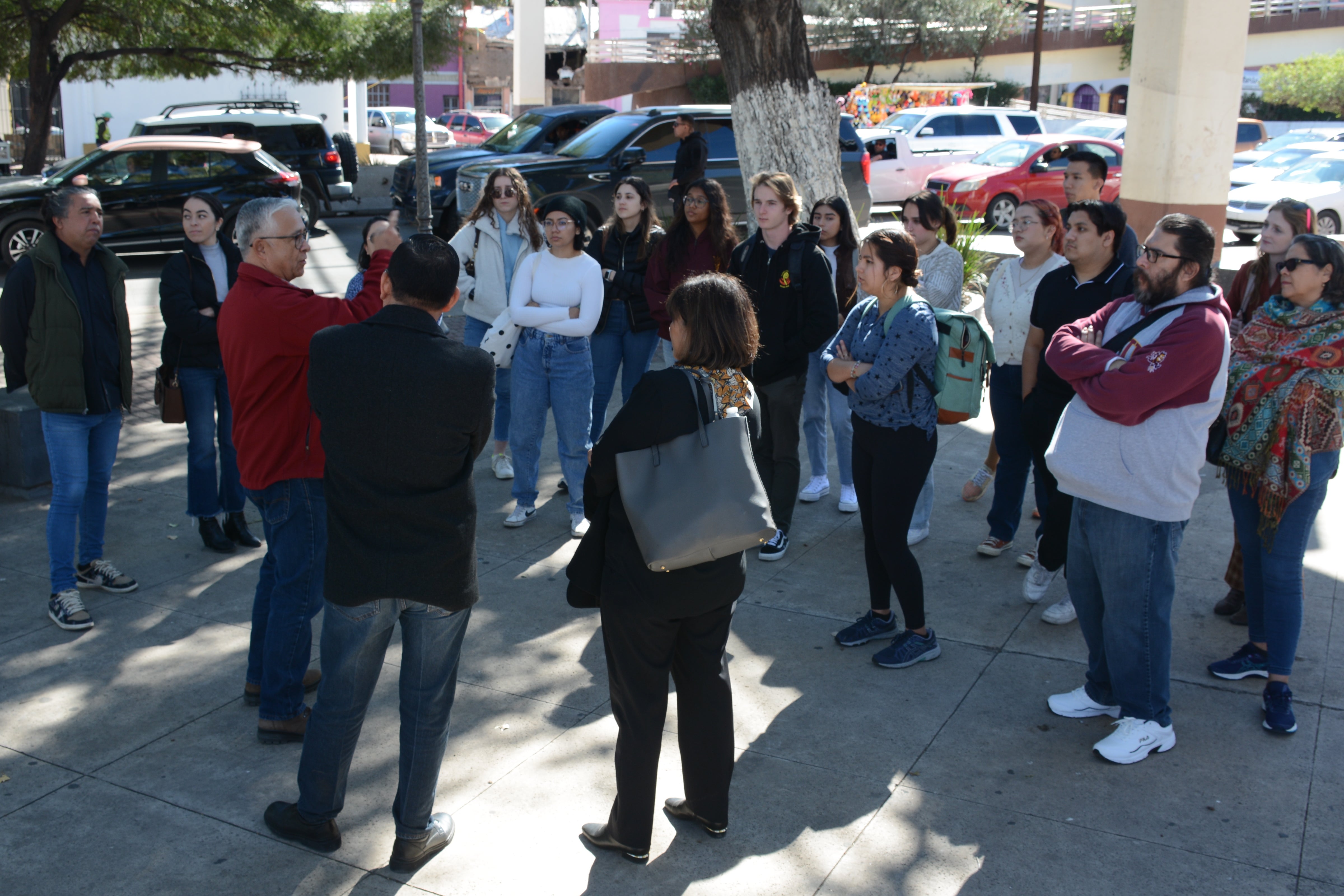 Local business owner,Jaime Gonzalez, gives a walking tour of the Nogales, Sonora, downtown area to ASU students on November 5, 2022.