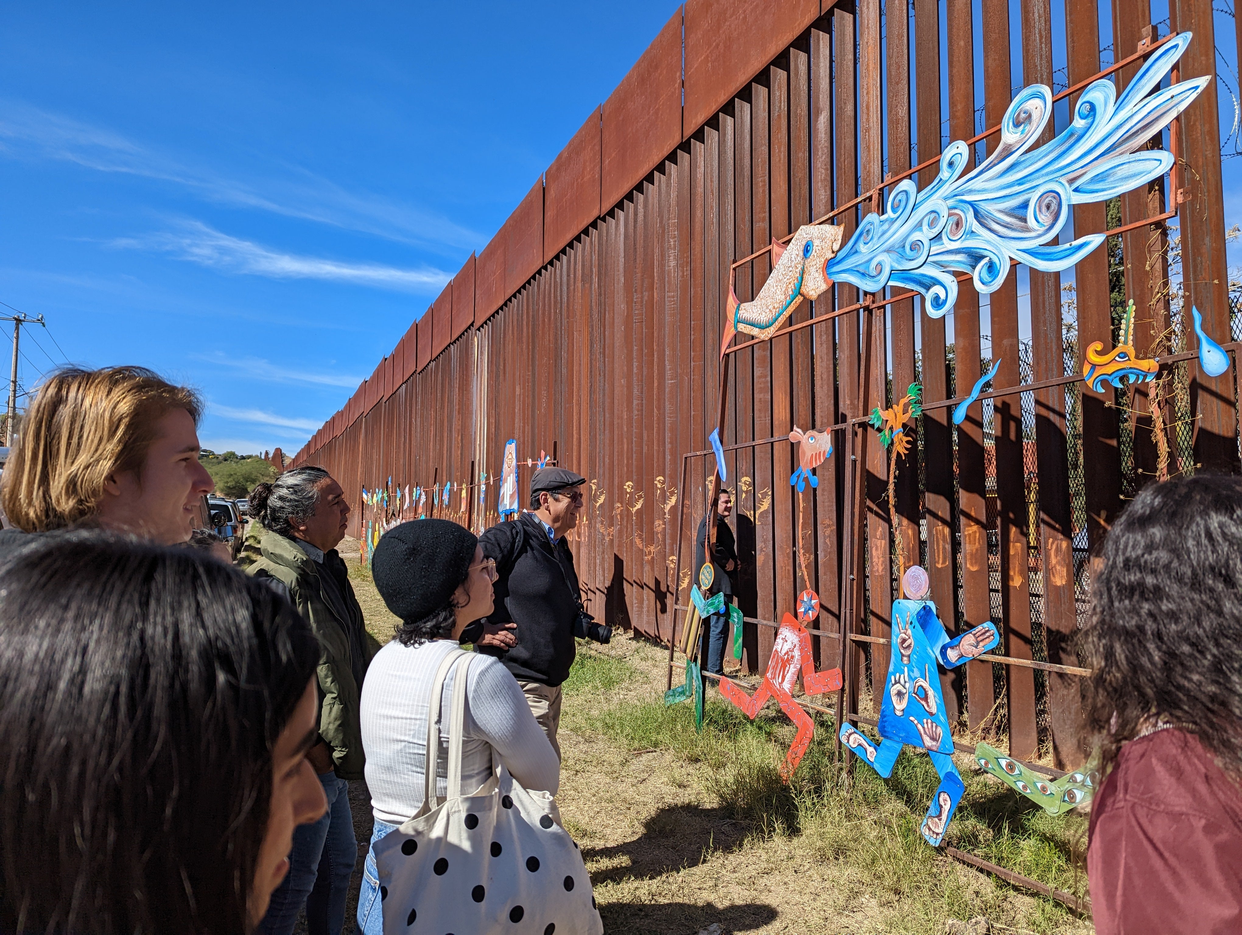 Students view border wall artwork and murals in Nogales, Arizona, on November, 5, 2022.