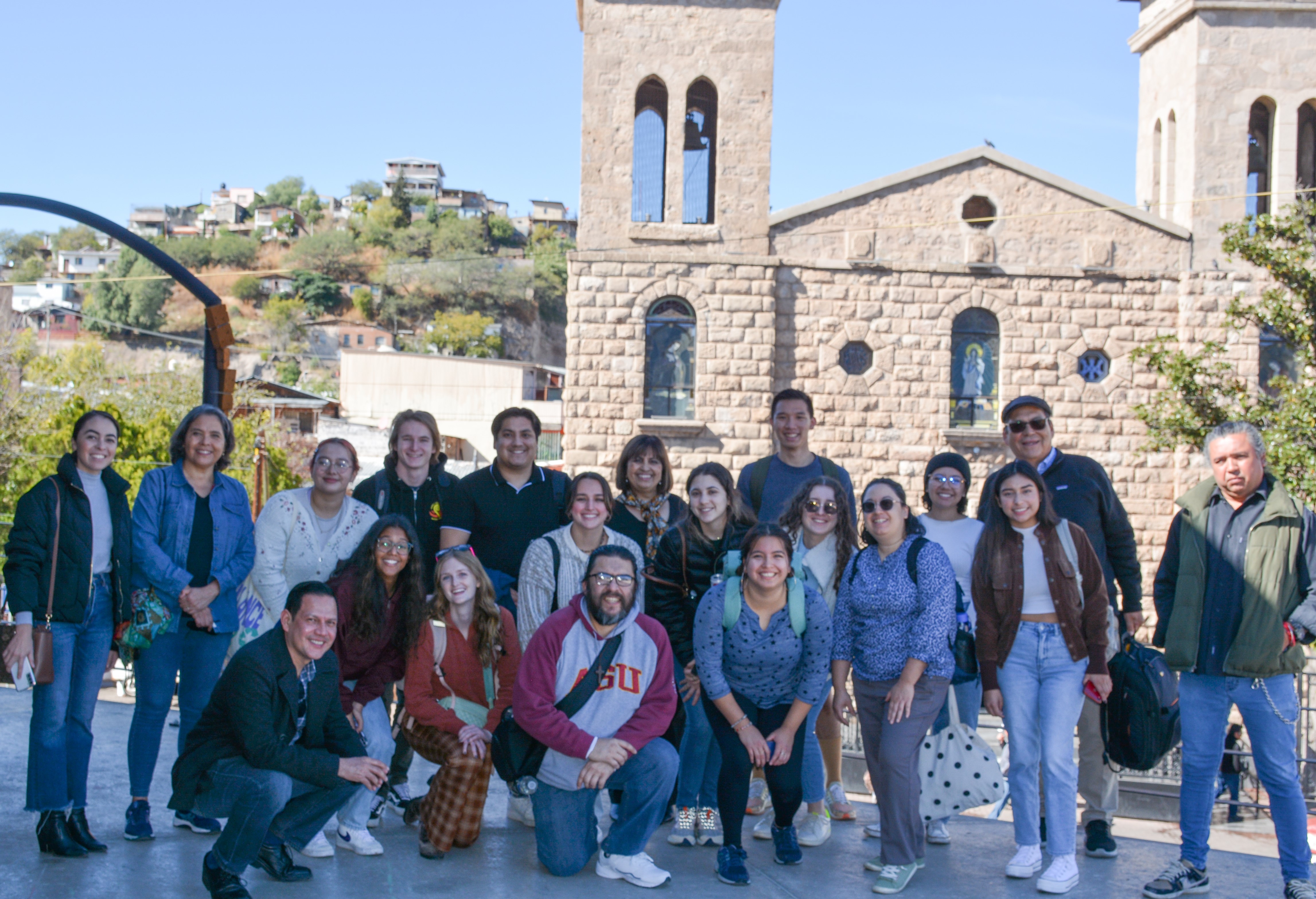 ASU students, professors, El Colegio de la Frontera Norte researchers Hilda Garcia  and Humberto Garcia, and the Museo de Arte de Nogales Director Guadalupe Serrano pose for a group photo outside the Museo de Arte de Nogales, Sonora, on November 5, 2022.